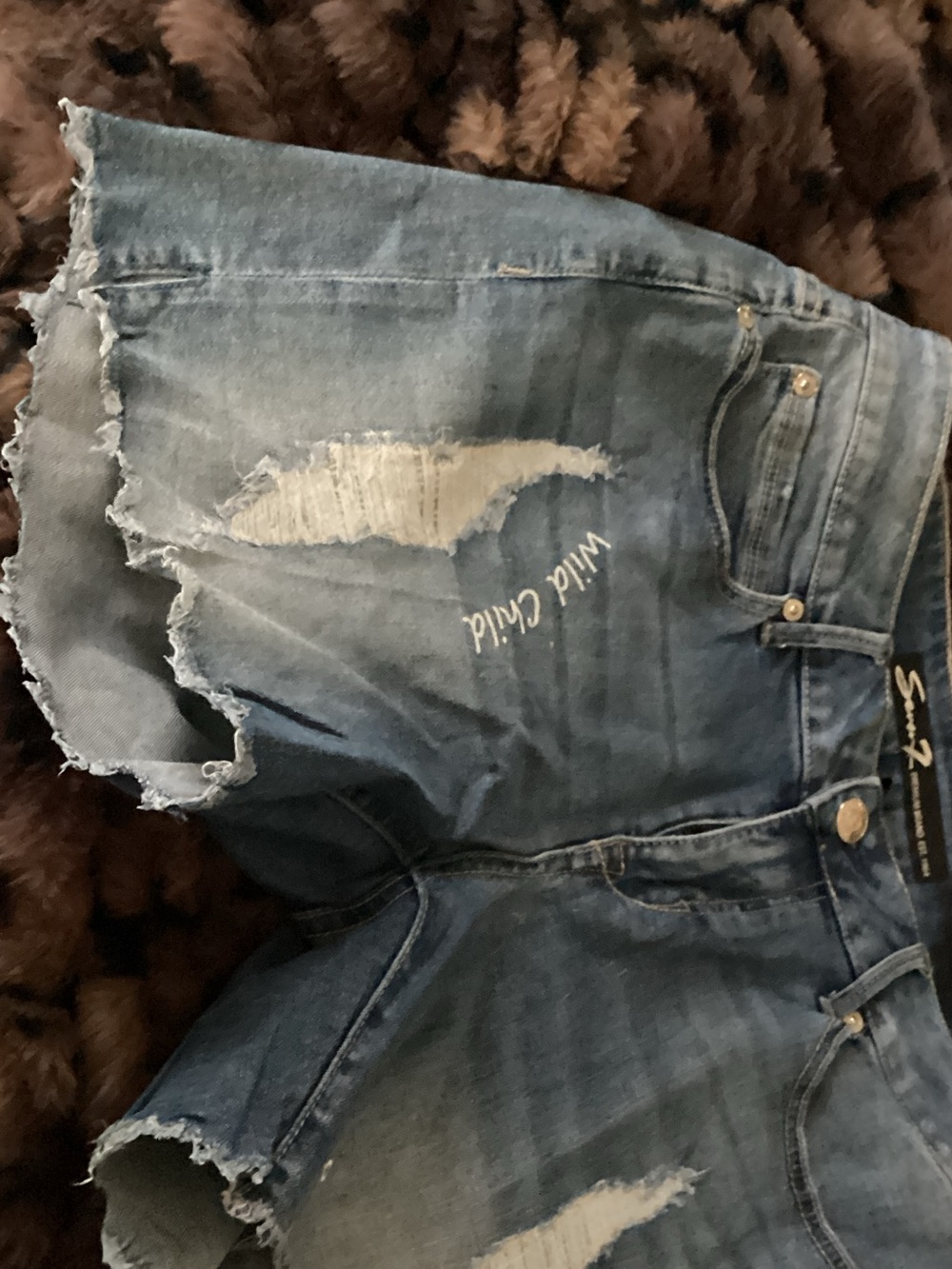 Seven7 Blue Distressed Denim Cutoff Shorts with 'Wild Child' Embroidery